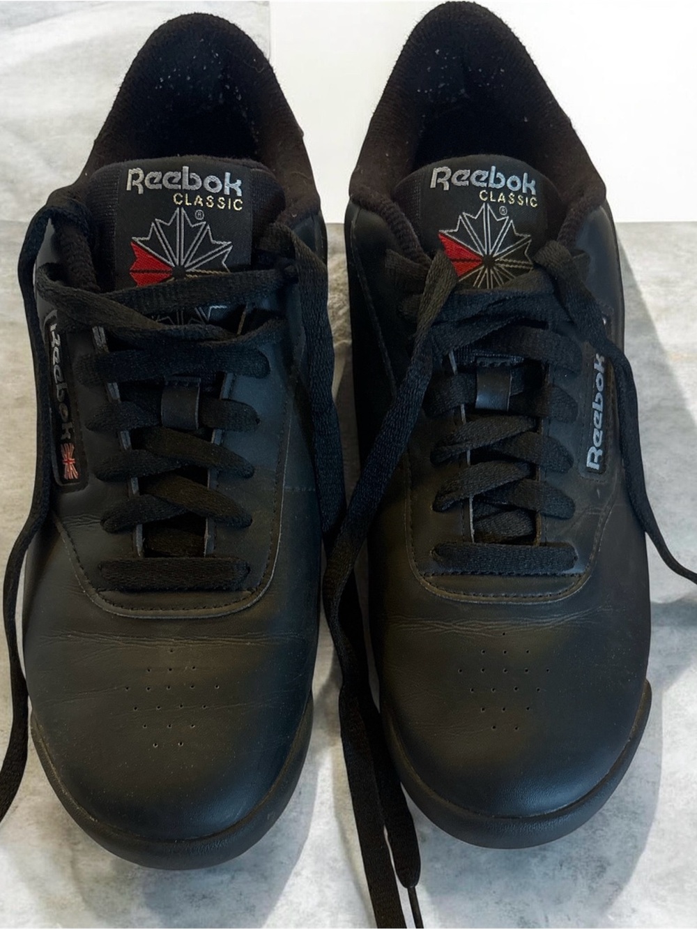 Reebok Classic Men's Black Leather Sneakers with Subtle Red Accent